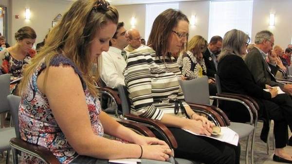 Plant City's observance of the National Day of Prayer will be noon Thursday at City Hall. Sandra Burdine, left, and her mother, Kimberly Johnson, are pictured at the 2013 Plant City day of prayer ceremony. FILE PHOTO